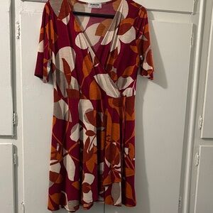 Vibrant Wrap Dress in Red and Orange Leaf Pattern